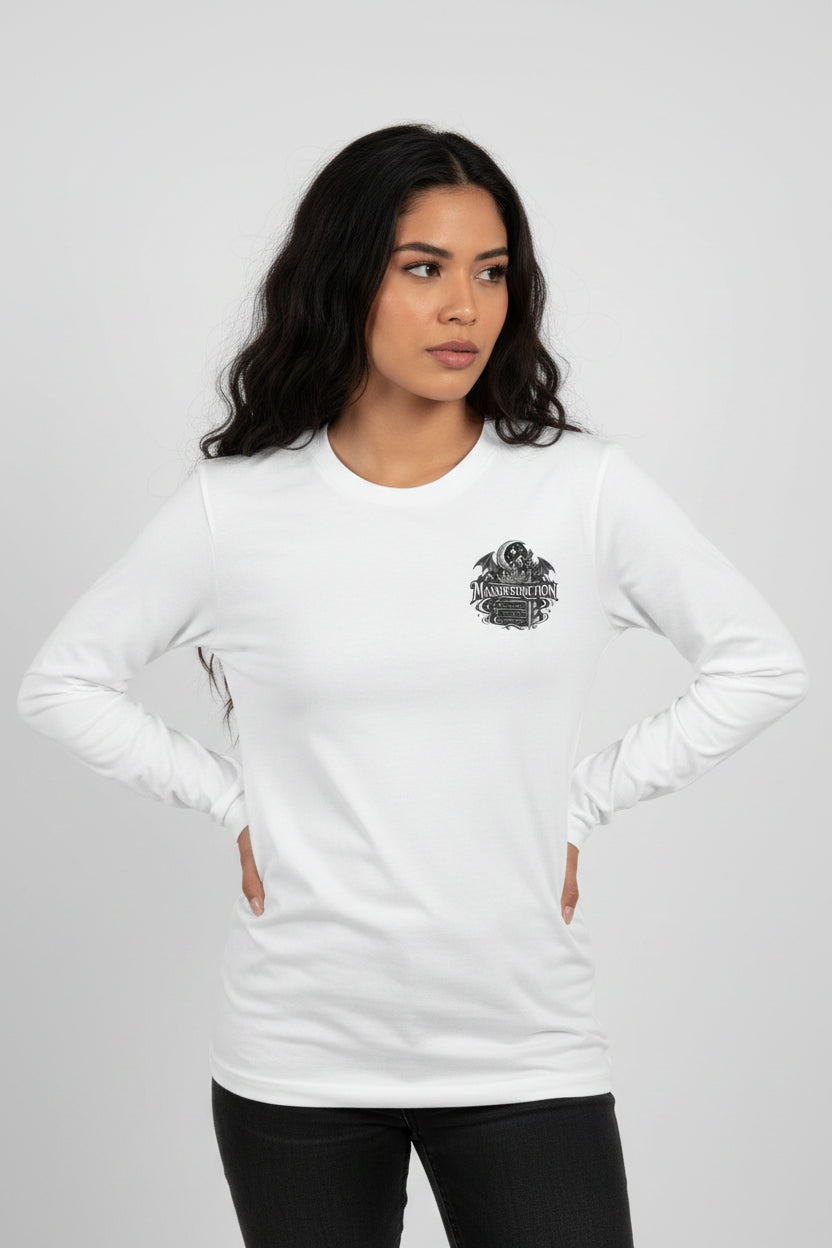 A white long-sleeve crewneck t-shirt featuring a black graphic print on the left chest with a skull, wings, and the word 'MASSDESTRUCTION'.