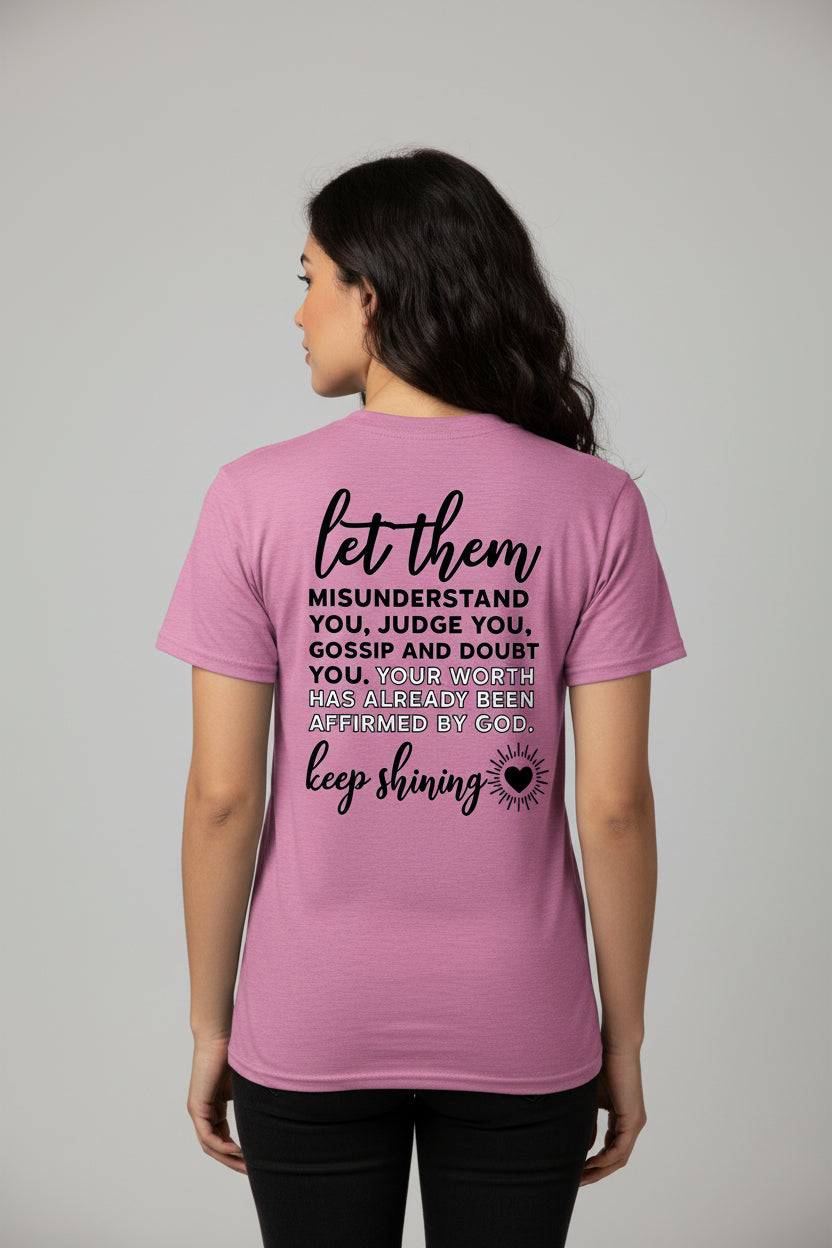 Purple t-shirt with motivational quote on a white background