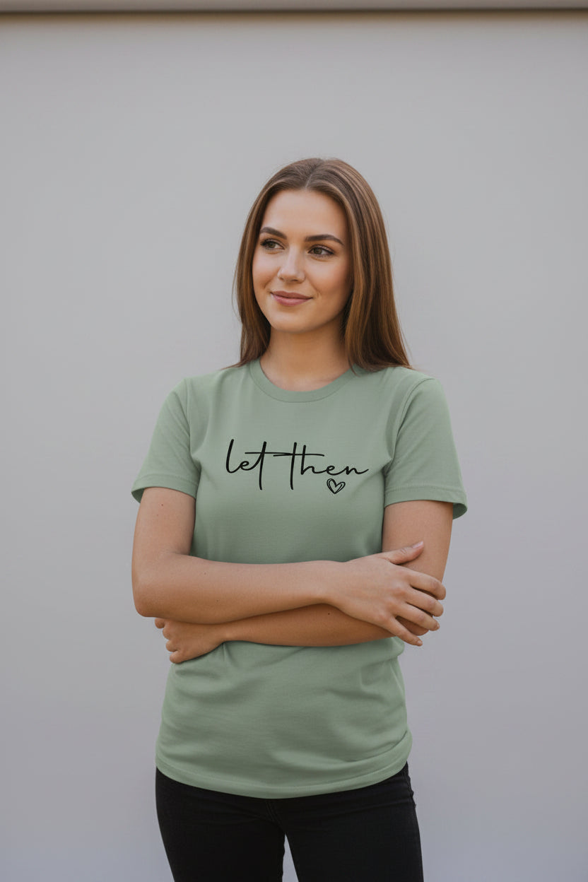 Light green t-shirt with 'let then' text and heart symbol on a white background